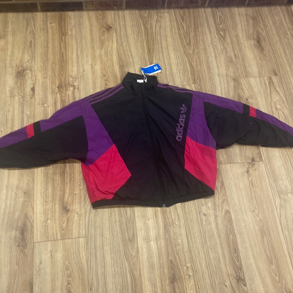 Brand new Adidas windbreaker comes with original tags